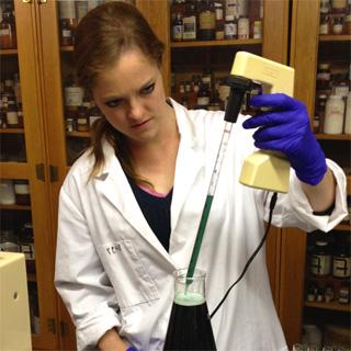 Student with a pipet 